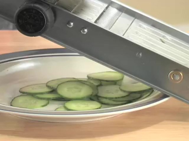 Pro Stainless Steel Mandoline Slicer with Bonus Food Pusher / Receptacle - image 8 from the video
